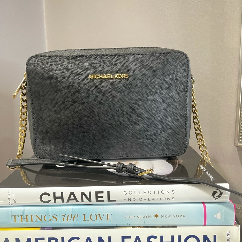 Michael Kors black with gold hardware crossbody